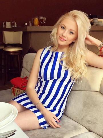 Нелли Кадом